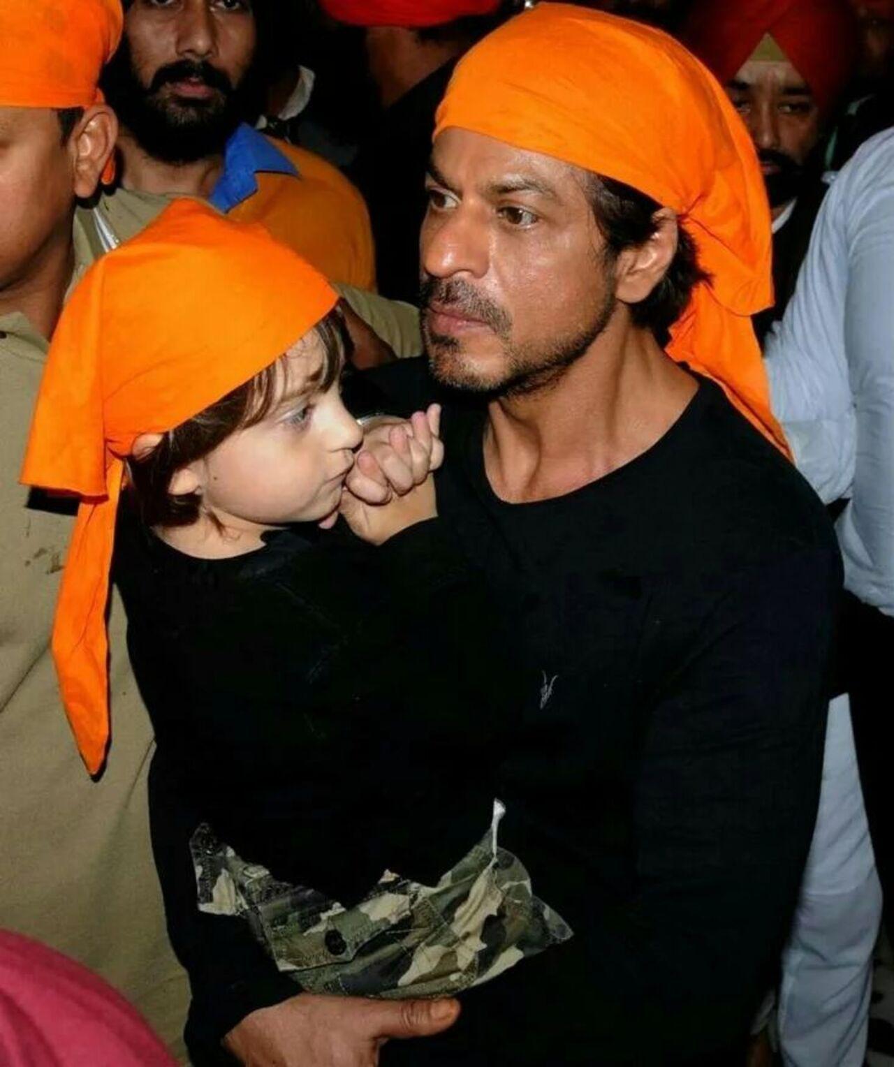 Shah Rukh Khan escorts little AbRam after a visit to the gurudwara